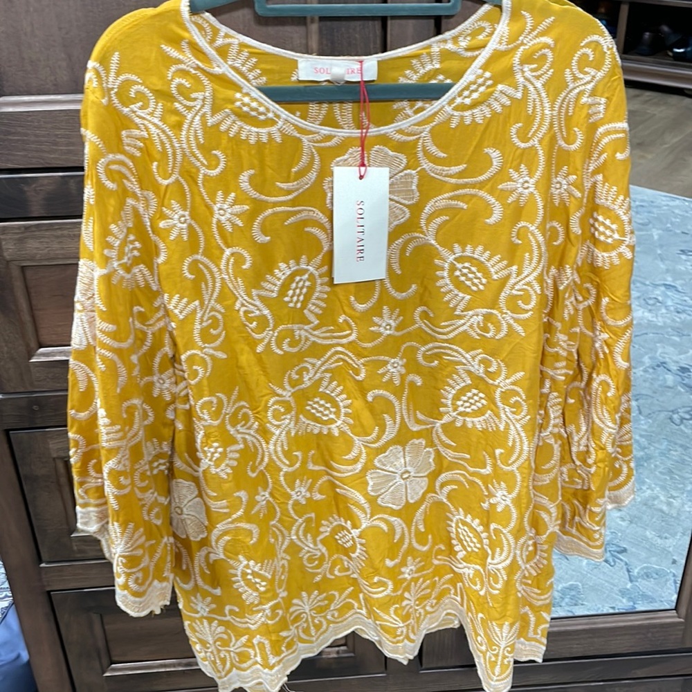 I have never worn this— it’s gorgeous— could dress up or down